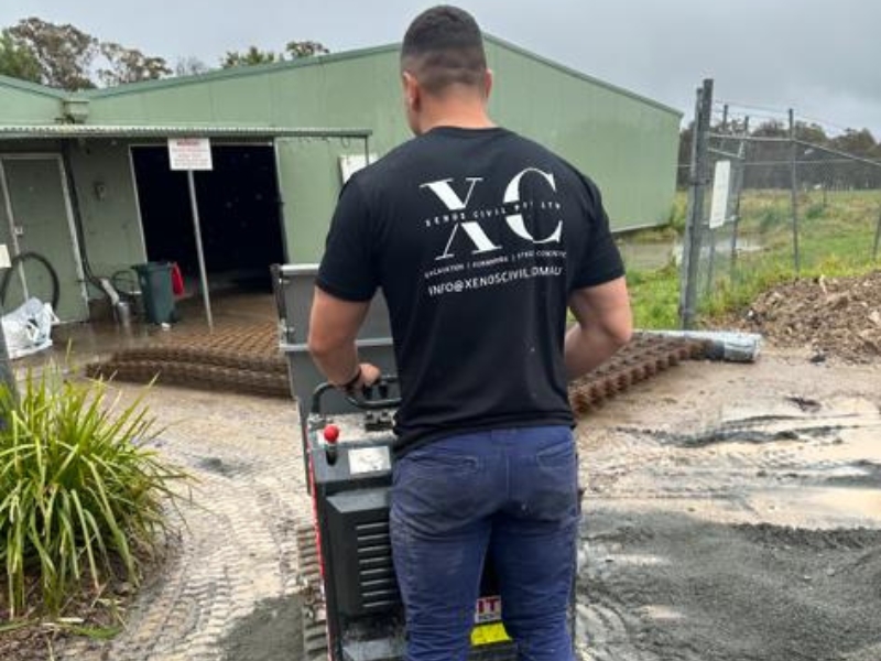 Xenos Cicil Worker Backyard Concreting